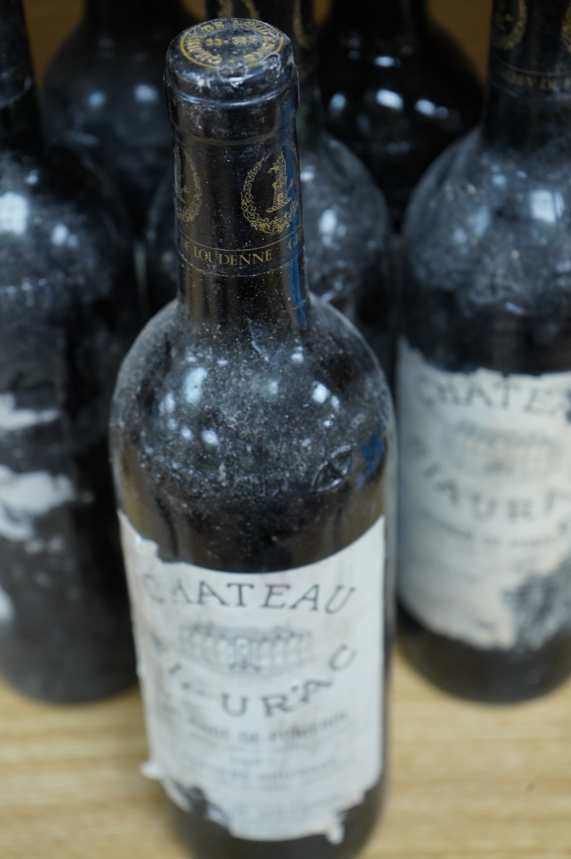 Eight bottles of Chateau Siaurac 1982, labels defective